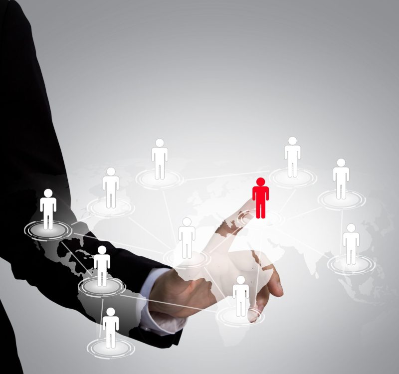 Social Network concept : hand point to social network and world map